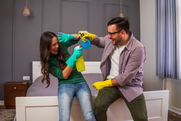 istock Couple cleaning apartment 1222735741