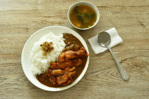 istock deep fried chicken dressing with Japanese curry on rice topping slice pickled cabbage 1222736740