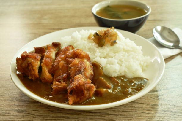 istock deep fried chicken dressing with Japanese curry on rice topping slice pickled cabbage 1222736741