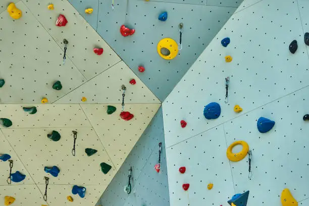 Photo of Detailed view of the fixing points and lugs of a climbing wall