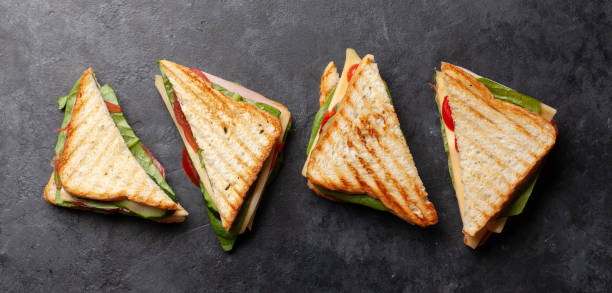 club sandwich with ham, cheese, salad and vegetables - sandwich club sandwich ham turkey imagens e fotografias de stock