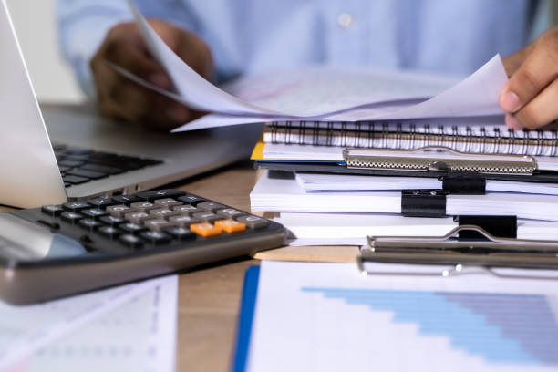 istock Businessman working reading documents graph financial to job succes Analyze document plans 1222738998