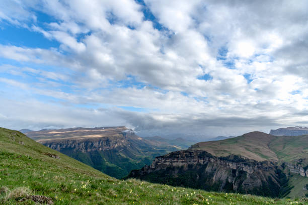 istock Summer landscape in mountains and the dark blue sky with clouds 1222739096