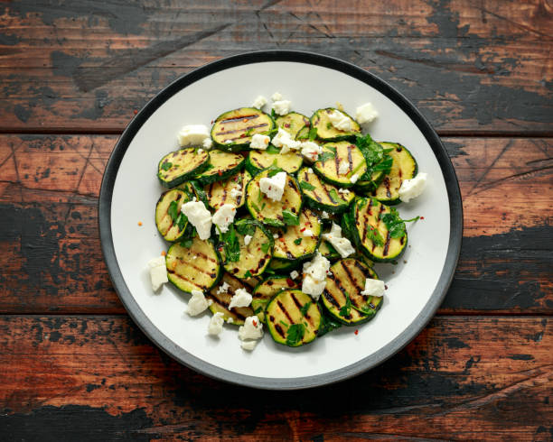 istock Warm salad with grilled zucchini, garlic and herbs 1222739456