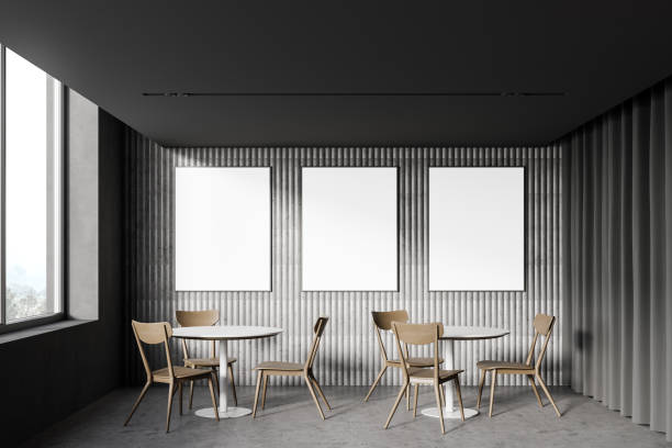 istock Poster gallery in loft cafe with round tables 1222739480