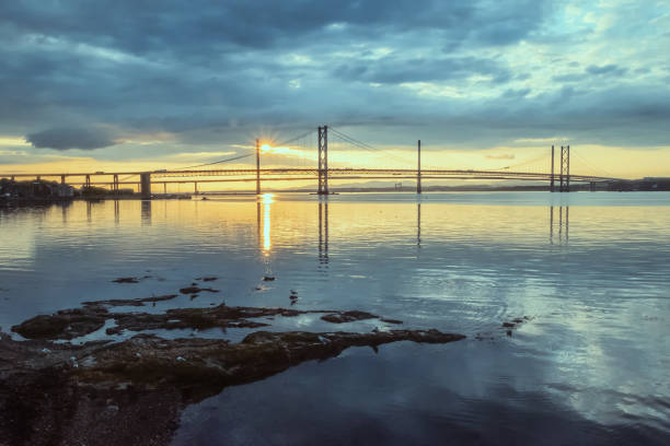 istock Two bridges against the setting sun and the sea 1222740307