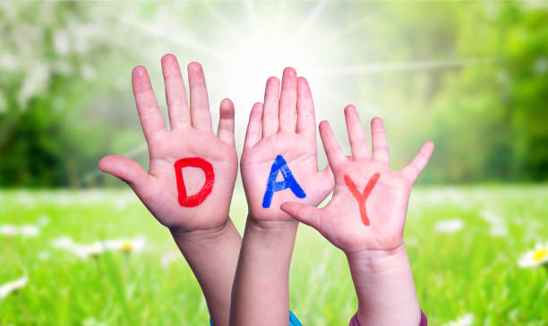 istock Children Hands Building Word Day, Grass Meadow 1222740680