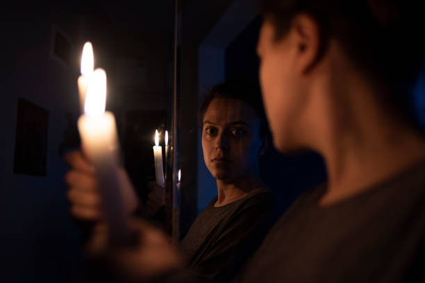 istock Woman with the candile at home 1222740938