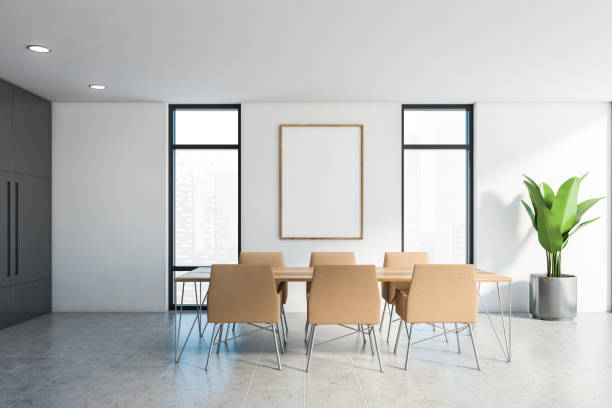 istock White and gray dining room interior with poster 1222740969