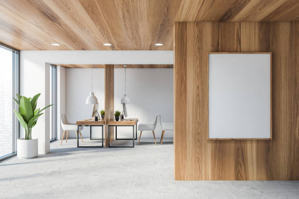 istock White and wood open space office with poster 1222744170