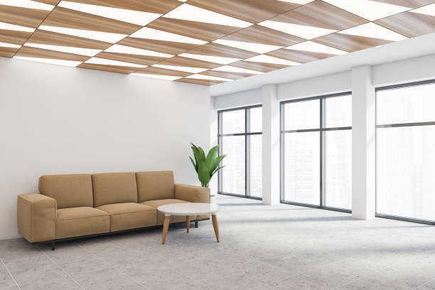 istock White office waiting room corner with beige sofa 1222745387