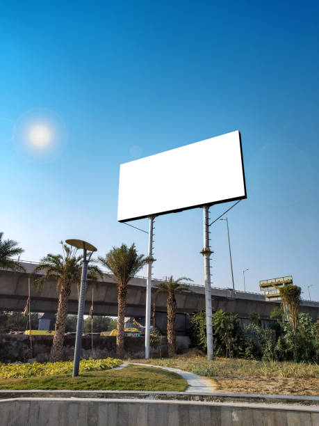 istock Blank billboard at roadside good viewership against clear sky 1222745525