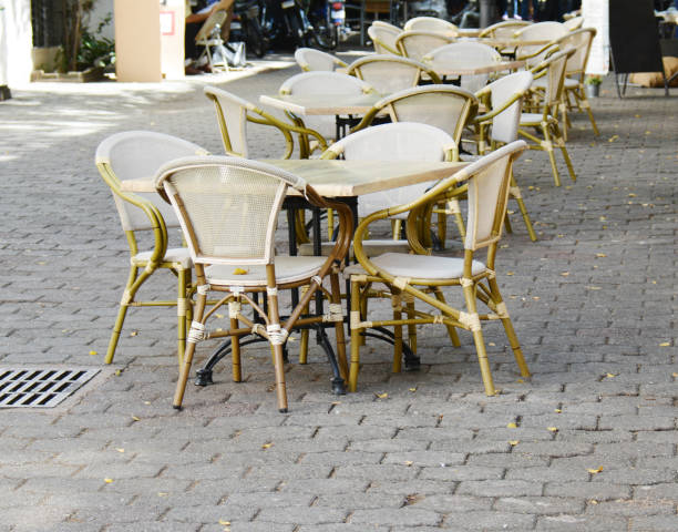 istock row of wicker chairs on the pavement 1222747196
