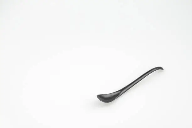 Photo of a spoon for scooping chemicals used in a lab.