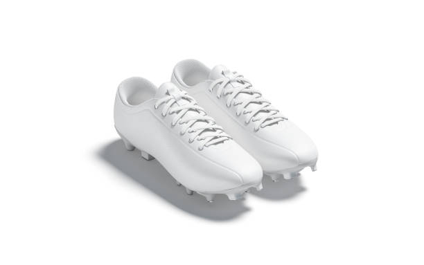 istock Blank white soccer boots pair with rubber cleats mockup, isolated 1222748005