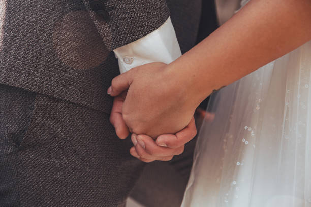 istock hands of the bride and groom 14 1222750351