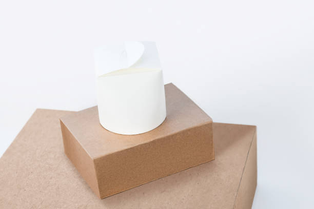 istock Close up picture of several brown boxes and a white box 1222750402