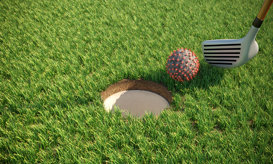 Coronavirus covid-19 standing near the hole on the golf course symbolizing ending the pandemic disease. ( 3d render )