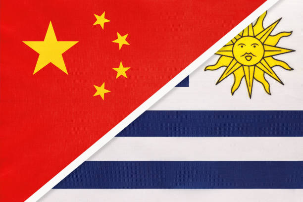 istock China or PRC vs Uruguay national flag from textile. Relationship between asian and american countries. 1222752929