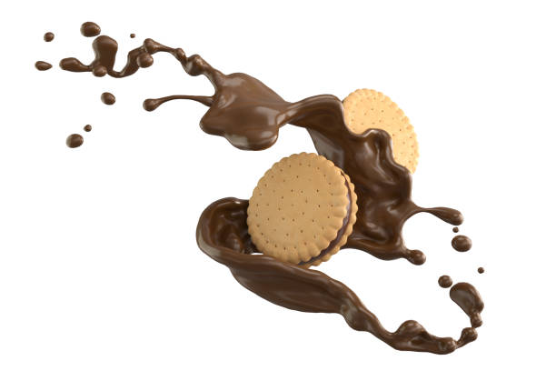 istock sandwich cookies with chocolate cream splash. 1222755149