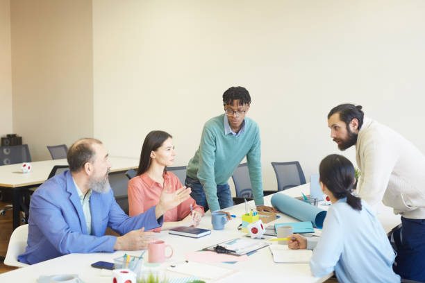 istock Group Of Designers On Meeting 1222755405