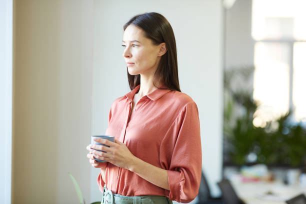 istock Young Woman Having Coffee Break 1222755407