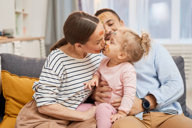 istock Mother Kissing Her Child 1222756223
