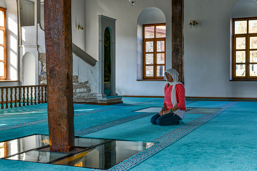 Cairo, Egypt, May 13 2021. Egyptian Muslims perform first Eid prayers at mosques in pandemic era, Only large-sized mosques were allowed to receive congregants to observe Eid Al-Fitr prayers.