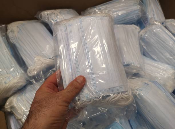 istock masks in the box ready for sale 1222762951