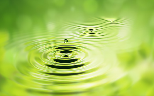 water dropswater drops  on green background - 3d rendering - illustration