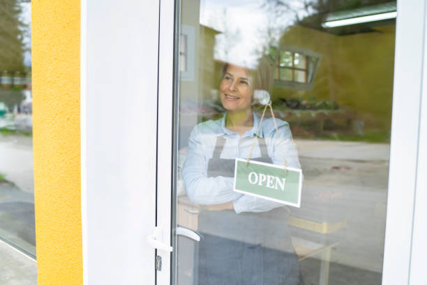 istock Owner happy to have her shop opened 1222764316