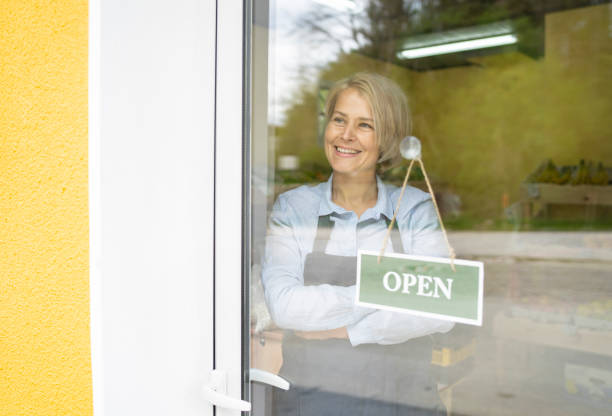 istock Owner happy to have her shop opened 1222764321