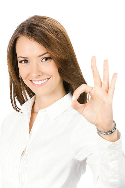 istock Business woman with okay gesture, isolated 122276497