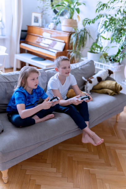 istock Screen time during pandemic. Boys playing video games. Skills contest 1222764997