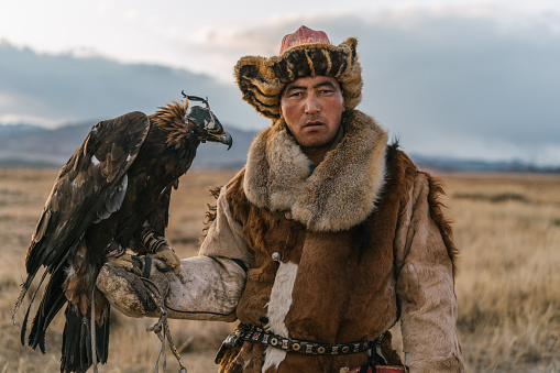Eagle hunter in steppe  in Mongolia