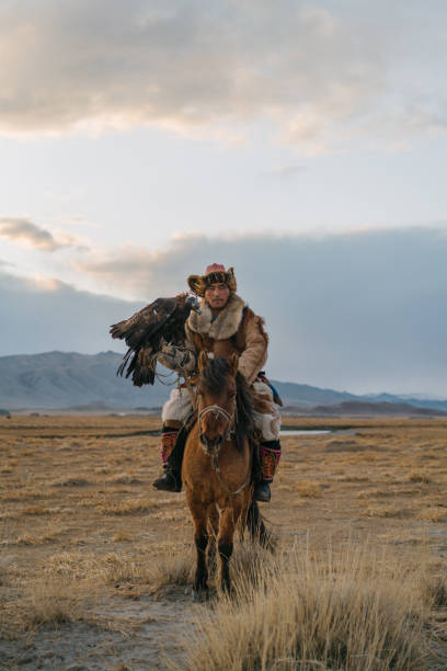 istock Eagle hunter on horse in steppe in Mongolia 1222766101