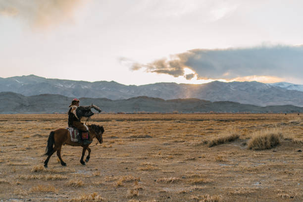 istock Eagle hunter on horse in steppe in Mongolia 1222766134