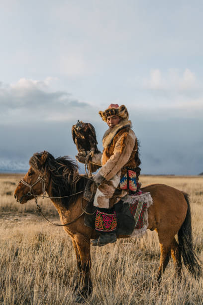 istock Eagle hunter on horse in steppe in Mongolia 1222766172