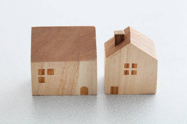 istock Miniature house on white background 1222766666