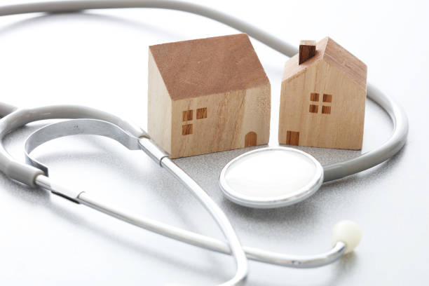 istock Miniature house and Medical stethoscope 1222766701