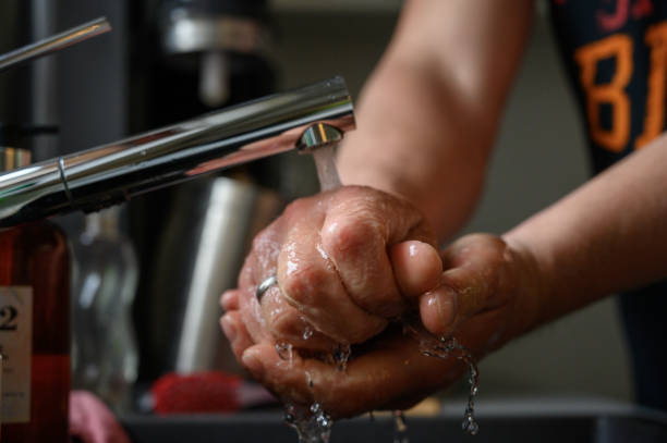istock Man washing his hands during the Covid-19 pandemic 1222768485