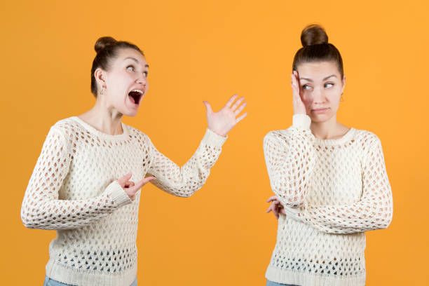 istock Split personality. The girl chastises herself and resists this herself 1222768722