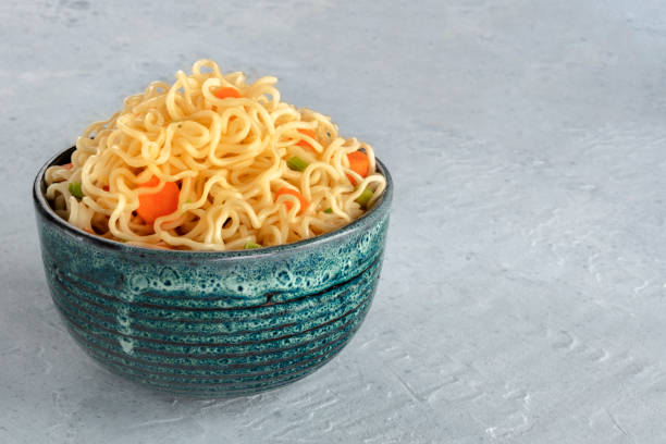 istock Instant noodles with carrot and scallions, vegetable soba bowl with copy space 1222770164