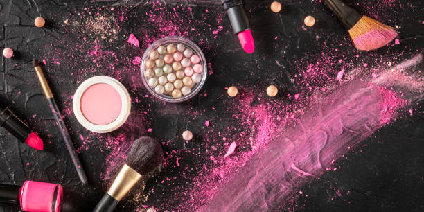istock Professional makeup panorama on a black background. Brushes, lipstick and other products, a flat lay with copy space 1222770453