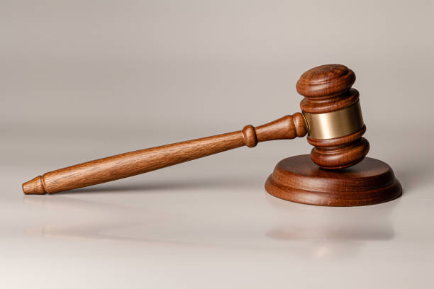 istock Wooden judges gavel on table close up 1222771484