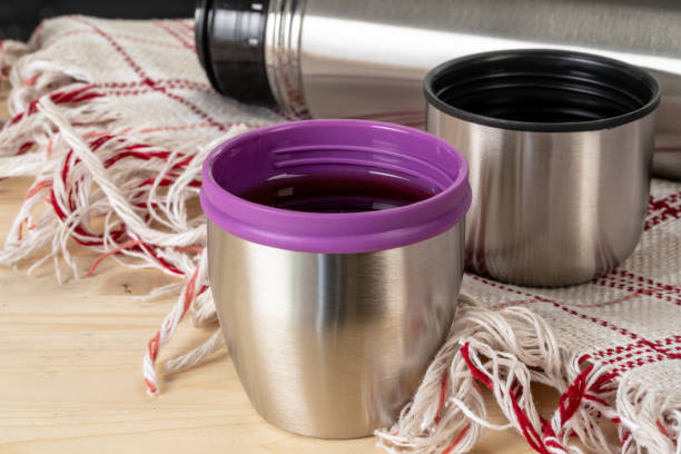 istock Aluminum metal thermos container bottle close up on table 1222772217