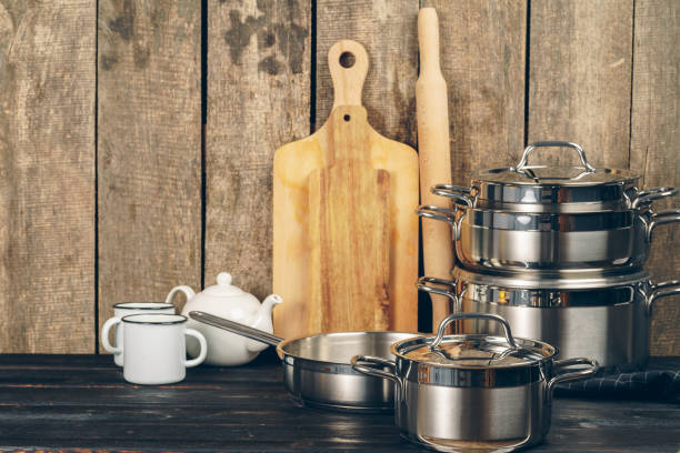 istock Set of dishware against old wooden background 1222773573