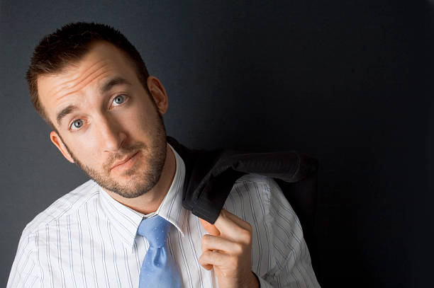 istock business man with jacket over the shoulder 122277483