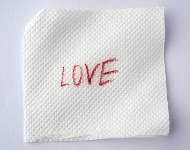 istock love written in red lipstick on a white paper napkin 1222775233