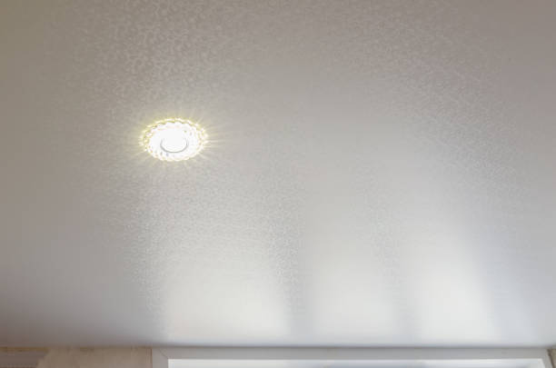 istock Ceiling in the room with spotlights installed and turned on 1222779978